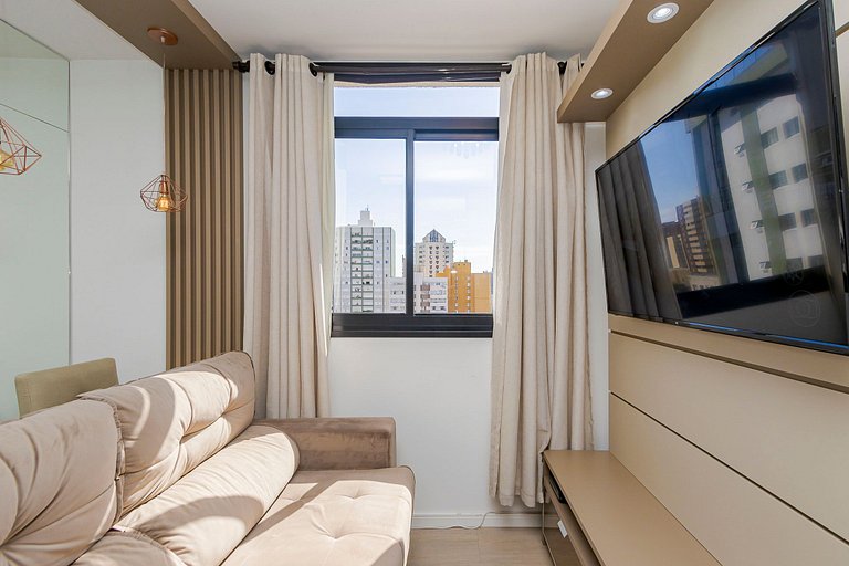 Apto de 1q com garagem no Centro - NEW1005