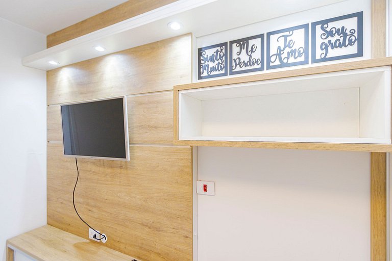 Apto de 1q com garagem no Centro - NEW1005