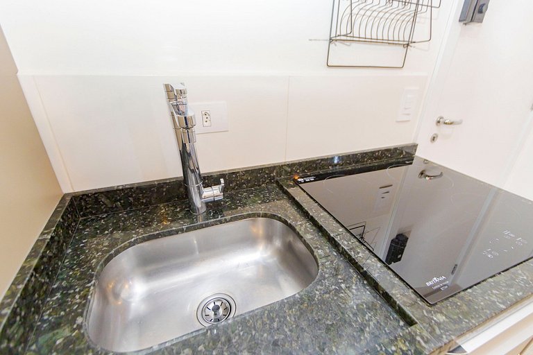 Apto de 1q com garagem no Centro - NEW1005