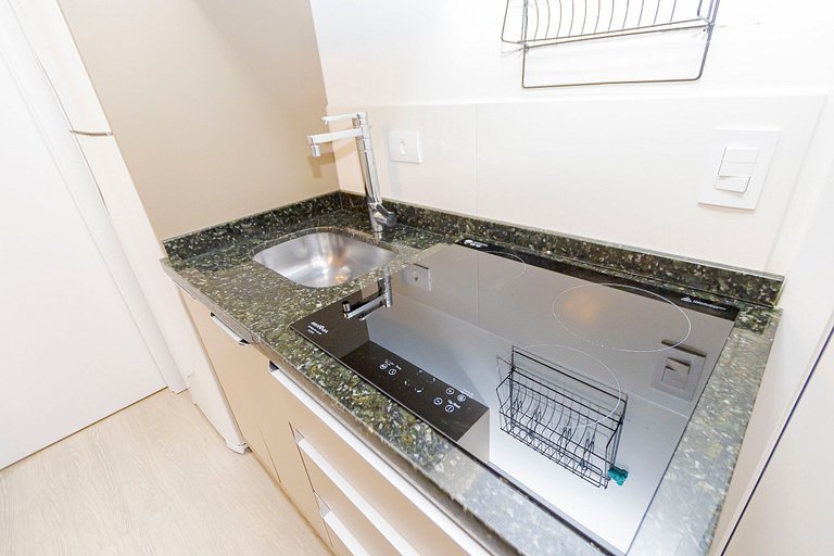 Apto de 1q com garagem no Centro - NEW1005