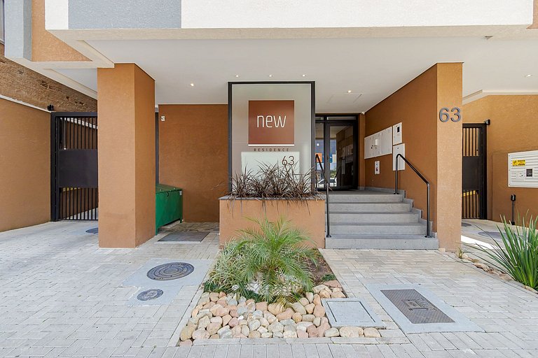 Apto de 1q com garagem no Centro - NEW1005